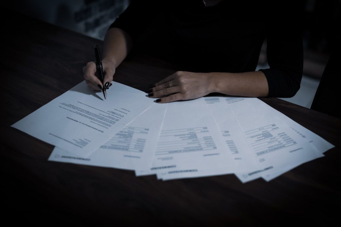 Woman with paperwork