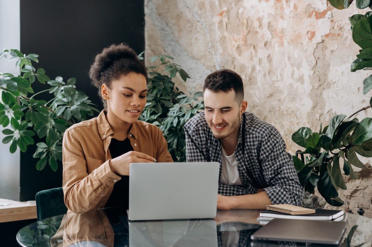 Couple looking at a laptop