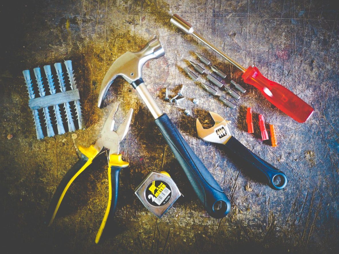 Tools on a plank of wood